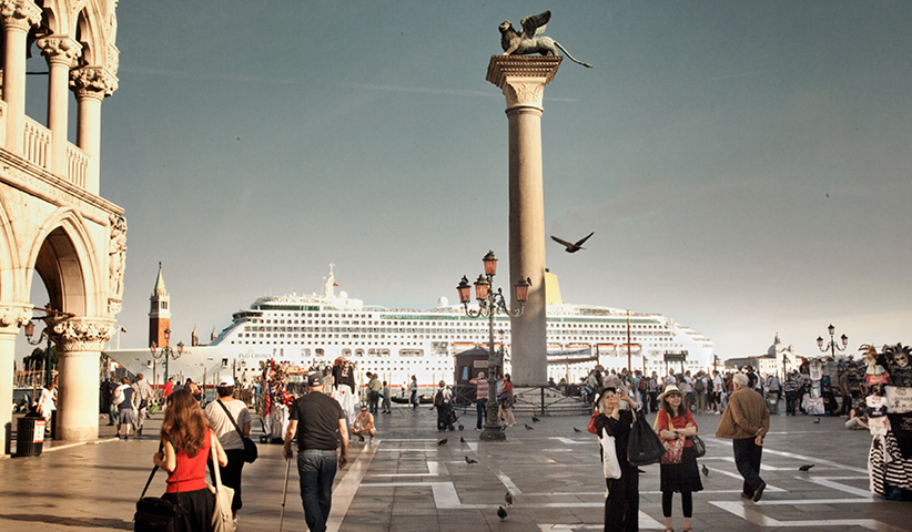 Tourists abound on land and water: A street scene at the Piazza San Marco in Venice
