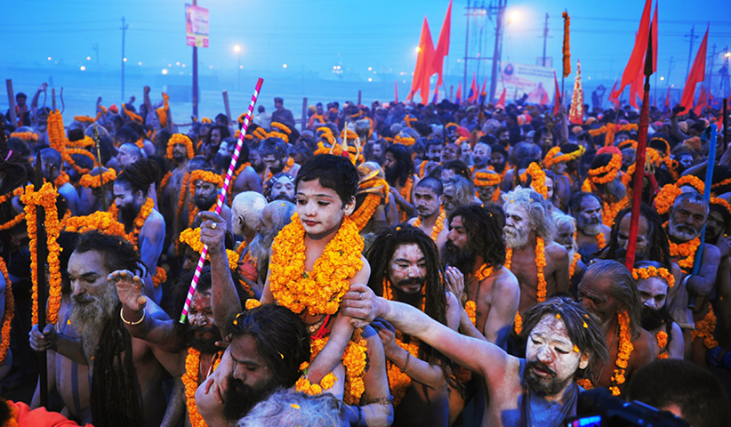 At the Kumbh Mela, the largest religious pilgrimage festival in the world, everything revolves around washing away sins. Sadhus, orange-clad Hindu monks and ascetics, lead the processions to the riverbank ablutions. Photo: Sanjay Kanoji/ AFP/ Getty Images