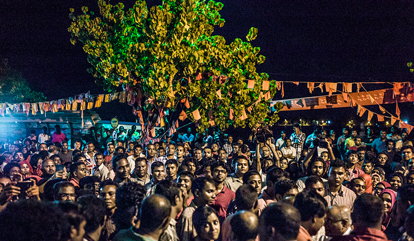 Supporters of former President Yameen celebrate his victory in 2013 at the headquarters of the Progressive Party of Maldives